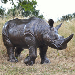 Small Metal Rhino Calf Garden Sculpture Garden Sculptures Candle and Blue Interiors