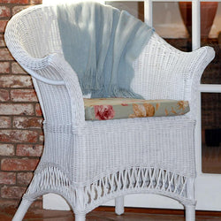 White Wicker Loom Style Chair Conservatory Furniture Candle and Blue